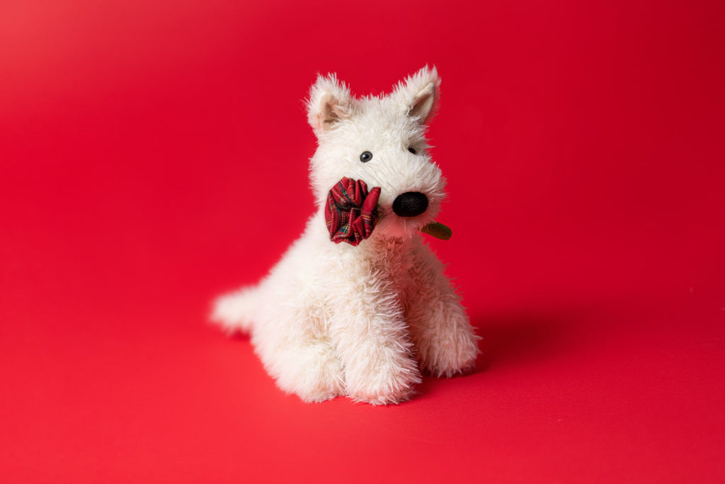 Jellycat Munro Dog Holding Rose