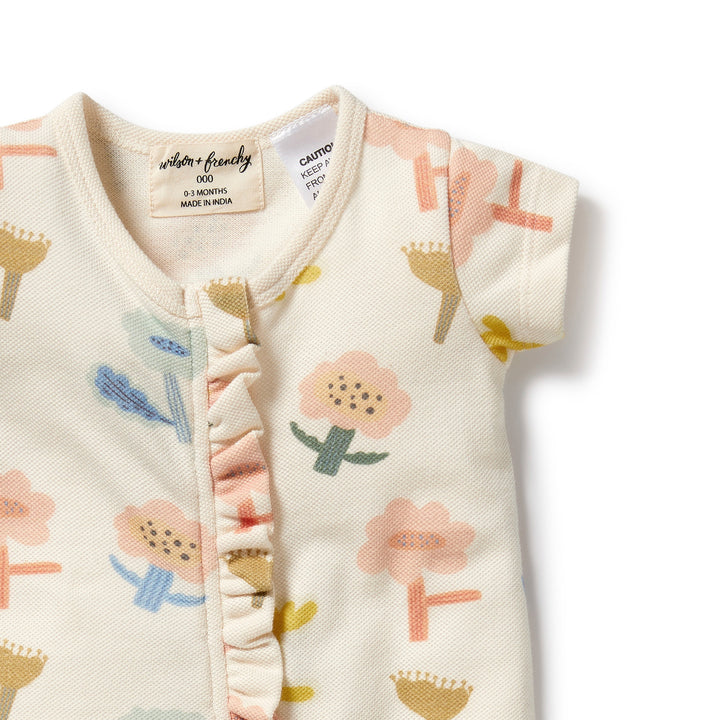 Wilson and Frenchy Cookie Cut Organic Ruffle Zipsuit