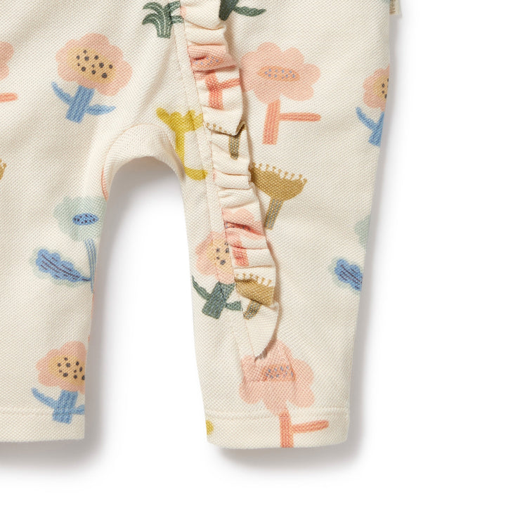 Wilson and Frenchy Cookie Cut Organic Ruffle Zipsuit