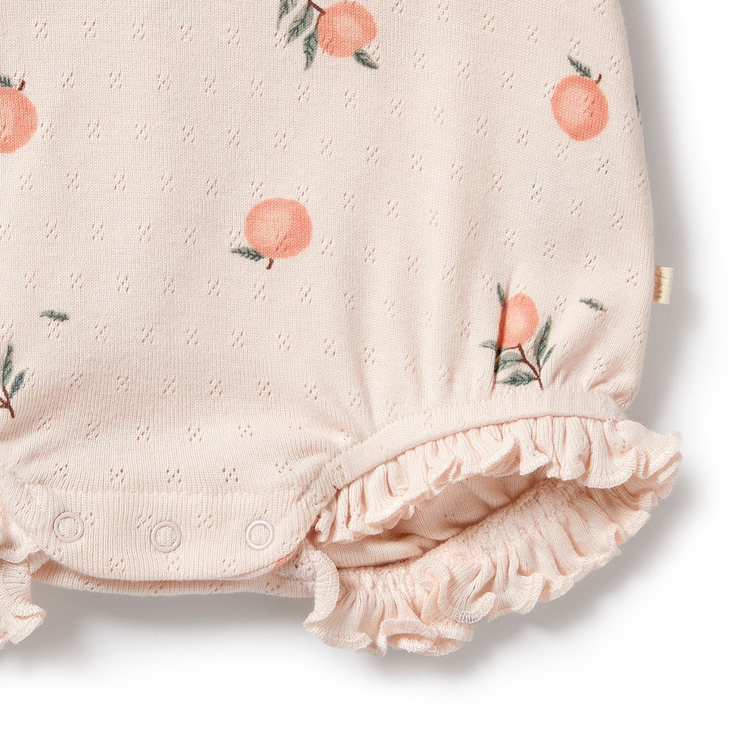 Wilson and Frenchy Peaches Organic Pointelle Ruffle Growsuit